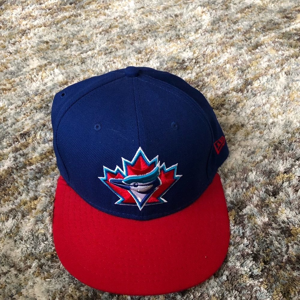 Royal blue and red Toranto Blue Jays fitted New Era hat.